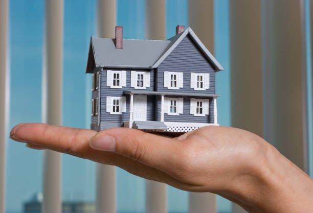 hand with model home.please see some similar pictures from my portfolio: